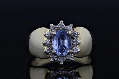 Estate Oval Tanzanite And Diamond Halo Ring 14K Yellow Gold